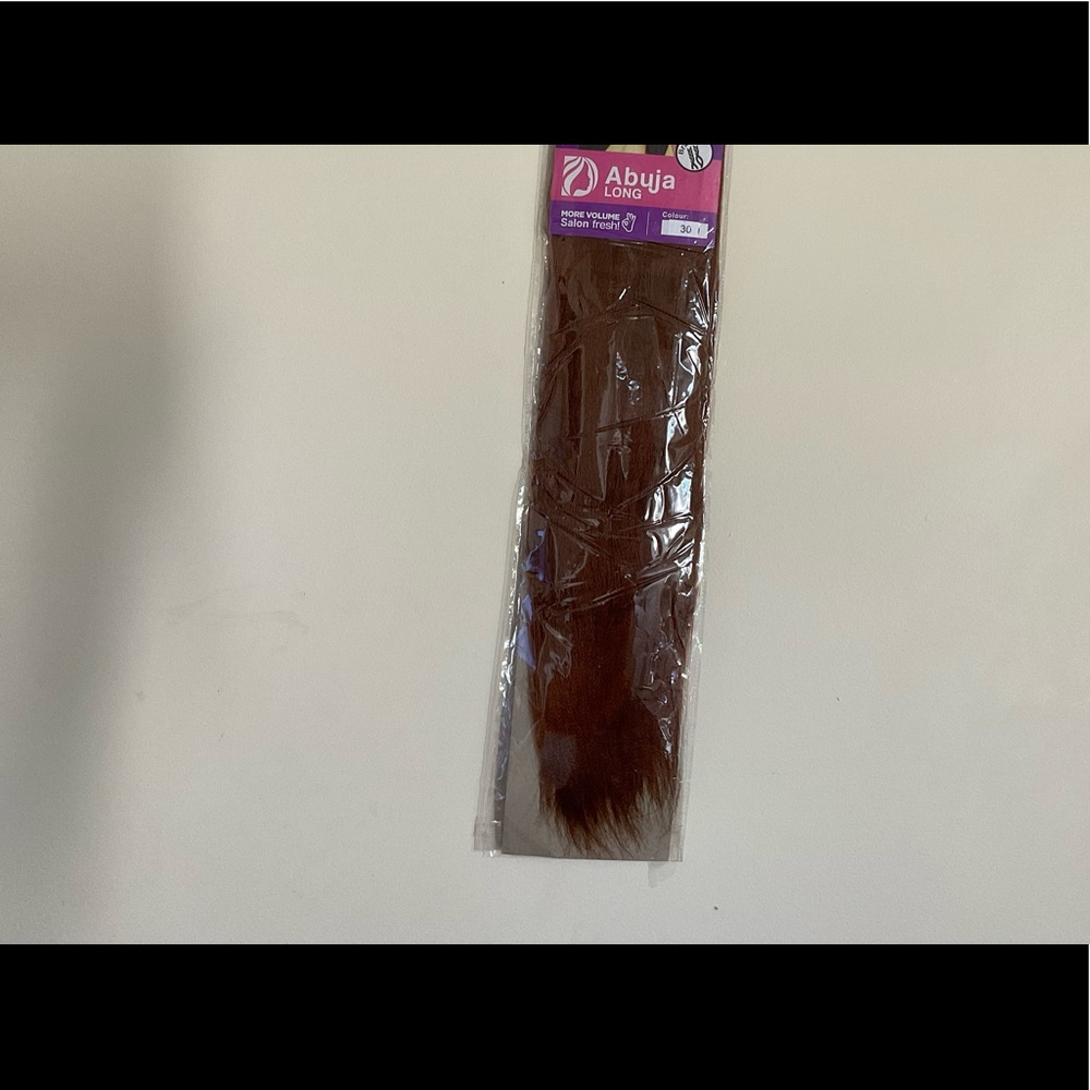 Hair braiding piece. Brown In colour. Brand Darling